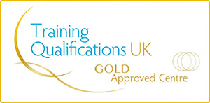 This image has an empty alt attribute; its file name is tquk-300w-gold.jpg